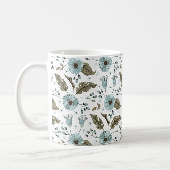 Blå och grön blommig kaffemugg (Vänster)