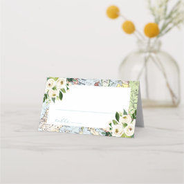 Blå och grön karta med blomstermotiv för resor placeringskort