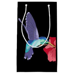 Blå och Grönt Hummingbird och röd Hibiscus