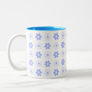 Blå och vit blommönster på vit tvåtons kaffekopp