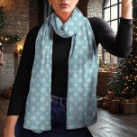 Blå och vit jul sjal<br><div class="desc">Bygg vintersäsongen med denna elegant blå och vit julscarf med en känslig snöflinga mönster. Den tidslösa blå bakgrunden och det kontrasterande vita snöflingor skapar en chic och ett mångsidigt utseende som kompletterar alla helgdag. Den här scarfen är gjord av lättviktschiffon och tillför en aning sofistikerad till vintern-garderoben samtidigt som den...</div>