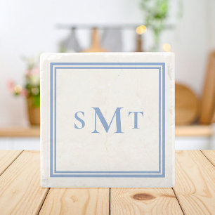 Blå och vit tresiffrig monogram stenunderlägg