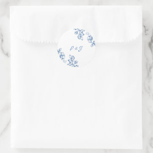 Blå och vita blommiga dekaler runt klistermärke