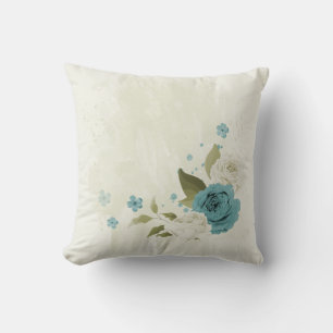 blå och vita blommor kudde