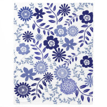 Blå och vitt Blommönster på en Blanket