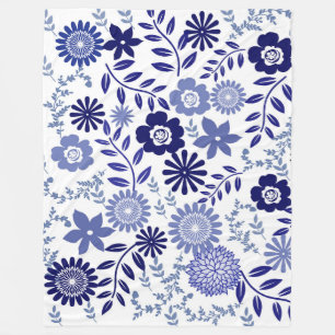 Blå och vitt Blommönster på en Blanket Fleecefilt