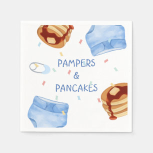 Blå pamrar och pannkakor tallrikar pappersservett