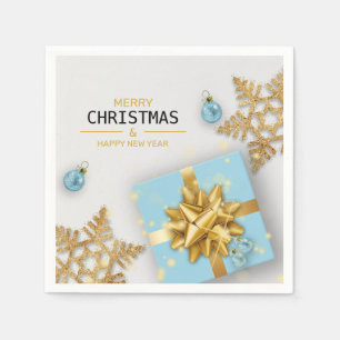 Blå presentlåda julgranskulor guld snöflingor pappersservett