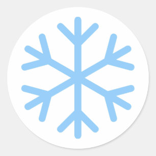 Blå snöflingdesign runt klistermärke