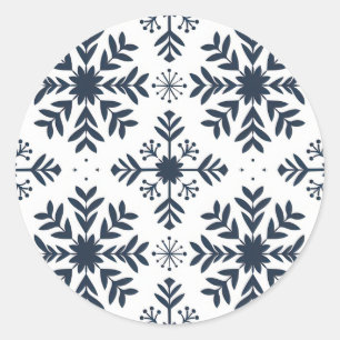 Blå snöflingstift runt klistermärke