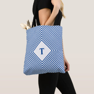 Blå strålande romber med centralt monogram tygkasse