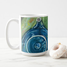 Blå tekanna och chai-konstverk kaffemugg