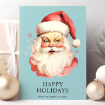 Blå Vintage Vattenfärg Jultomten jul Helgkort<br><div class="desc">Skicka festive hälsning med vårt blå Vintage Watercolor Jultomten-julkort för Helgdag! Det här charmeringskortet har en nostalgisk vattenfärgad illustration av Jultomten som ställs mot en livfull bakgrund, försedd med delikat snöflingor. Perfekt för att sprida helgdag, detta kort fångar julens tidlösa anda. Insidan är tom, vilket gör att du kan anpassa...</div>