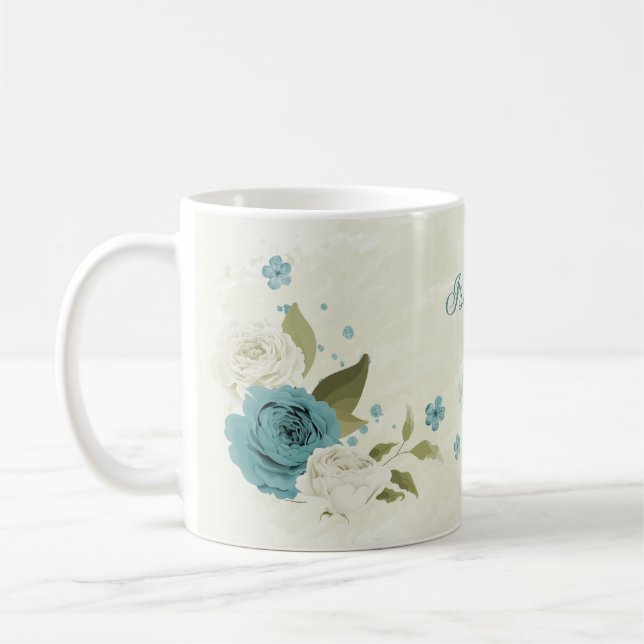 blå vita blommor grönska kaffemugg (Vänster)