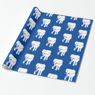 Blå vita elefant i julspel i form av utväxling presentpapper