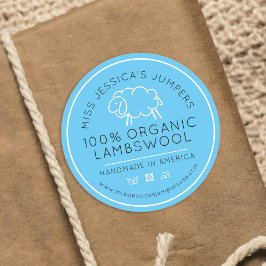 Blå, vita stickor runt klistermärke