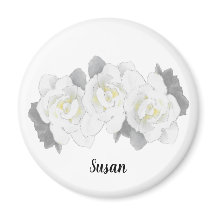 Blå vita trädgårdsblommor på vitt