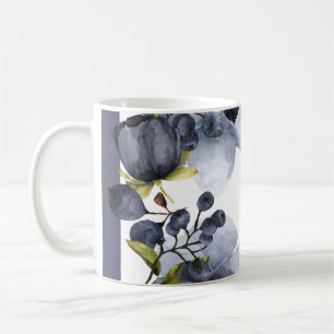 Blåa blommor och frukter i ram kaffemugg