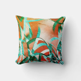 Blåa eller cyanstreak över den röda, röda orangen kudde