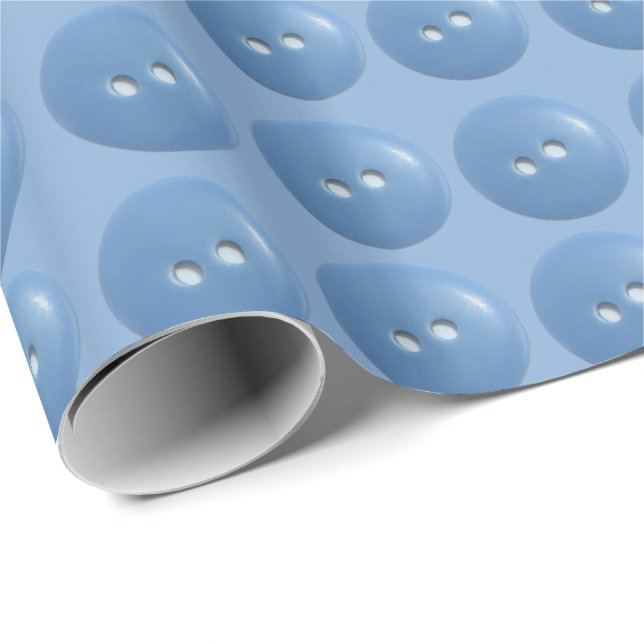 Blåa syknappar på blå mönster presentpapper (Rullad Hörn)