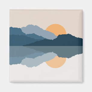 Blåberg som reflekteras i sjö magnet