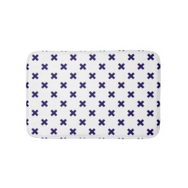 Blåblå kor syllar på vitt badrumsmatta