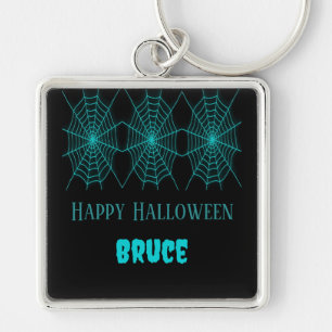 Blåblå spindelnät i happy halloween fyrkantig silverfärgad nyckelring
