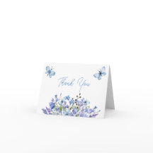 Blåblommor och fjärilar i tack