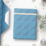Blåbrun Mönster i elegant Presentpapper<br><div class="desc">Elegantens klätterverk Blåbrun Mönster-Papper för julafton. Bläckbrun klätterväxt på blå bakgrund.</div>