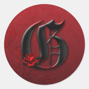 Black and Röd ros Monogram G Sticker Runt Klistermärke