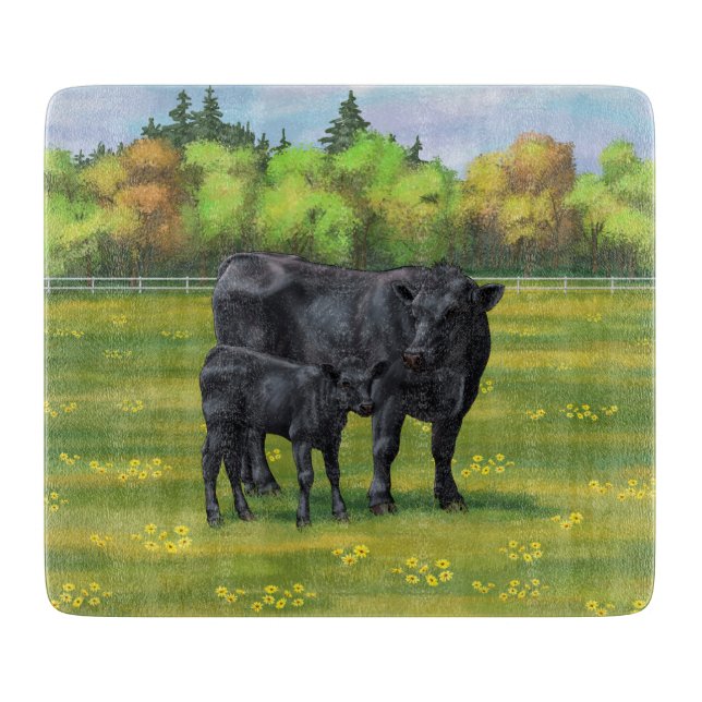 Black Angus Cow & Cute Calf på sommarbetesmark (Framsidan)
