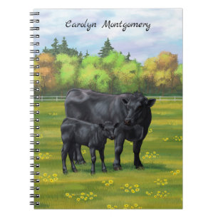 Black Angus Cow & Cute Calf på sommarbetesmark Anteckningsbok