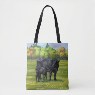 Black Angus Cow & Cute Calf på sommarbetesmark Tygkasse