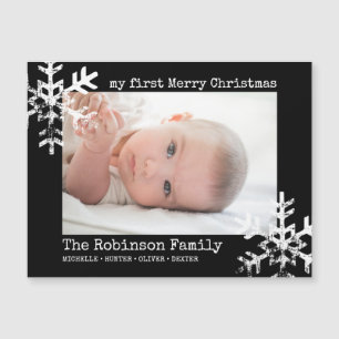 Black Baby 1:a julfoto Snöflingor