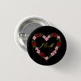 Black badge with a pink and red heart knapp