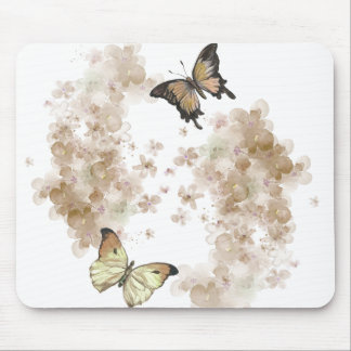 Black Brown butterflies med blommor Musmatta