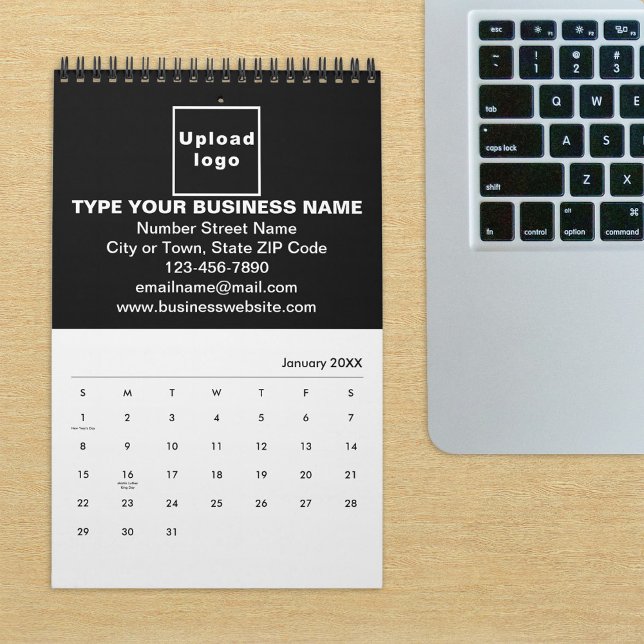 Black Business Brand på Kalender (Build brand name awareness. Black business branding on calendar displayed on office desk.)