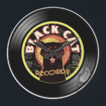 Black Cat LP Art Deco<br><div class="desc">Är du den kallaste katten? Vi tänka det! ..och skapade det ultimata påstående på humör och musik. Vår kombination av mystisk katt och mjuk musikmärkning kommer att få alla dina vänner att undra var du har den... ta dig upp lite kylig med den här Black Cat Records-designen som finns tillgänglig...</div>