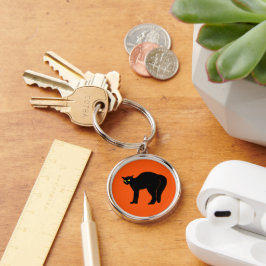 Black Cat on Vibrant Orange Rund Silverfärgad Nyckelring