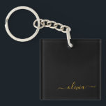 Black Guld Modern Script Girly Monogram Namn<br><div class="desc">Nyckelkedjan Black and Guld Simple Script Monogram Namn. Det gör perfekten söt 16-årsjubileum,  bröllop,  möhippa,  årsdag,  babydusch eller bachelorette-fest för någon som glam lyxen och chic stilar i kärlek.</div>