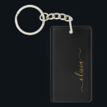 Black Guld Modern Script Girly Monogram Namn Nyckelring<br><div class="desc">Nyckelkedjan Black and Guld Simple Script Monogram Namn. Det gör perfekten söt 16-årsjubileum,  bröllop,  möhippa,  årsdag,  babydusch eller bachelorette-fest för någon som glam lyxen och chic stilar i kärlek.</div>