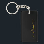 Black Guld Modern Script Girly Monogram Namn Nyckelring<br><div class="desc">Nyckelkedjan Black and Guld Simple Script Monogram Namn. Det gör perfekten söt 16-årsjubileum,  bröllop,  möhippa,  årsdag,  babydusch eller bachelorette-fest för någon som glam lyxen och chic stilar i kärlek.</div>