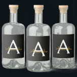 Black Guld Modern Script Girly Monogram Namn Spritflaskor Etikett<br><div class="desc">Svart och Guld Monogram Namn Liquor (Vodka,  Whiskey,  Gin,  Rum) Flaska-etikett. Det gör perfekten söt 16-årsjubileum,  bröllop,  möhippa,  årsdag,  babydusch eller bachelorette-fest för någon som glam lyxen och chic stilar i kärlek.</div>