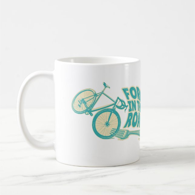 Bläck i den lustiga cykeln kaffemugg (Vänster)