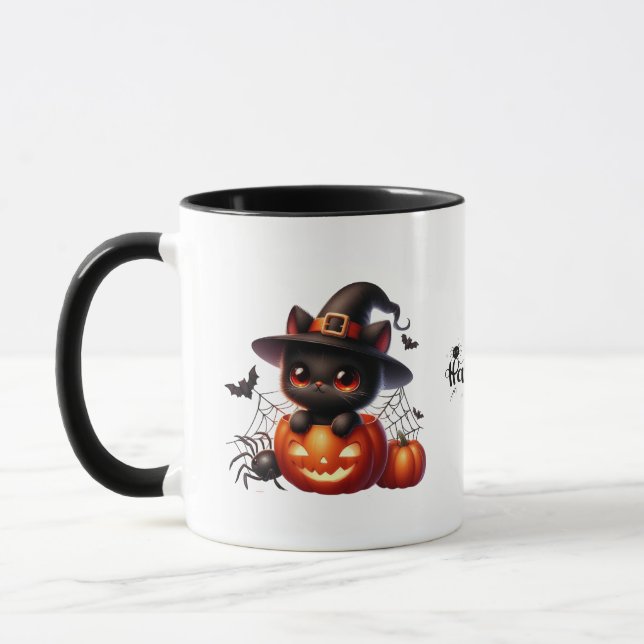 Black Kitten i en Halloween Pumpkin Mugg (Vänster)
