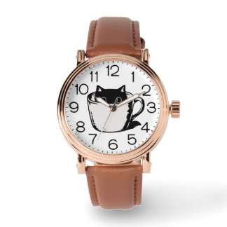 Black kitten with red nose hiding in a cup armbandsur