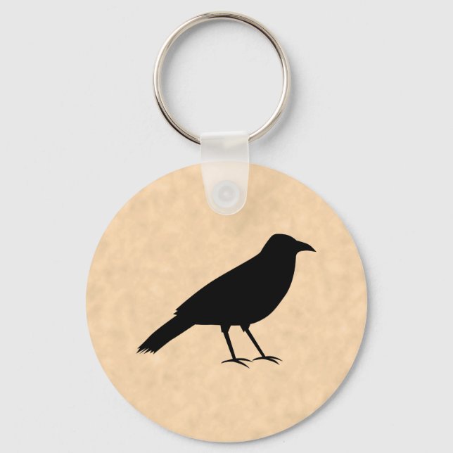 Black Kråka Bird på ett Parchment Mönster. Nyckelring (Framsida)