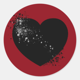 Bläck krossade svart hjärta. runt klistermärke