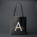 Black Namn Guld Girly Script Monogram Modern Tygkasse<br><div class="desc">Svart och Guld Elegant lägg till din egen Namn Monogram Bok Bag. Denna Bok-bag kan anpassas så att den omfattar ditt första och första namn och ges som julklapp,  Sverige 16 födelsedagar,  Möhippa eller Bröllop.</div>