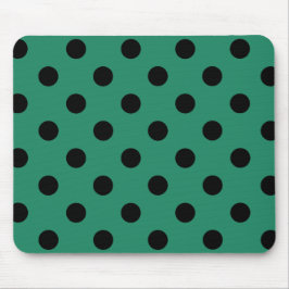 Black polka dots in green musmatta